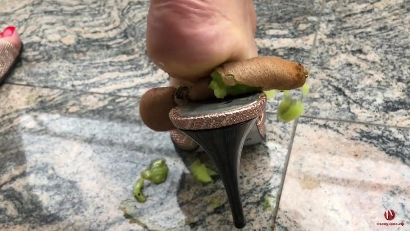 Goddess Lena Crushing a kiwi 2