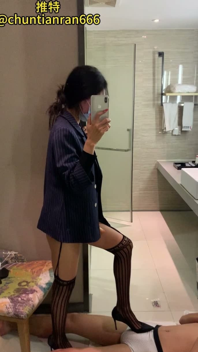 A Girl In Black High Heels Stomped On Her Sex Slave's Penis And Performed Footjob. 2